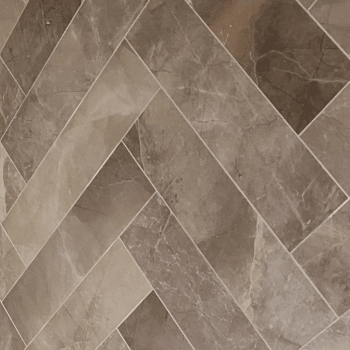 bronze marble tile in herringbone pattern